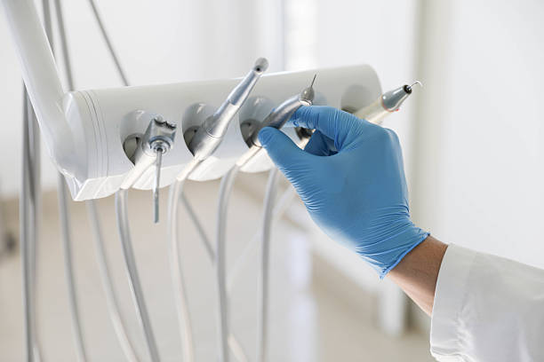 Professional Invisalign Clear Aligners technician working in Stowell, TX